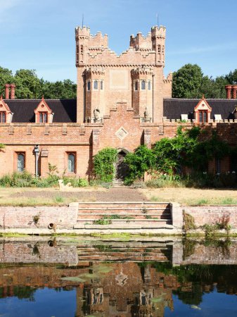 Photo for A vertical shot of Oxburgh Hall, a moated country house in Oxborough, Norfolk, England - Royalty Free Image