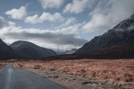 Photo for A beautiful view of the Buachaille Etive Mor with clouds in Glencoe - Royalty Free Image