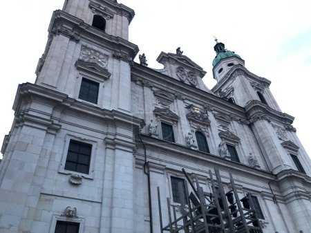 Photo for A low angle view of majestic Salzburg Cathedral against cloudy sky background, Austria - Royalty Free Image