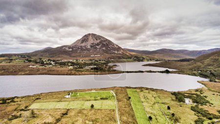 Photo for An aerial shot of the Errigal mountain seen on a cloudy day during the day - Royalty Free Image