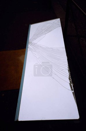 Photo for A vertical shot of a broken mirror of a building - Royalty Free Image