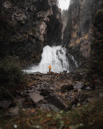 Photo for A vertical shot of the mesmerizing Riva waterfalls in the Dolomites in South Tyrol, Italy - Royalty Free Image