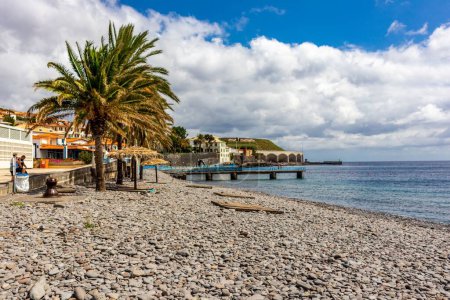 Photo for A beautiful Atlantic island beach in Madeira near Santa Cruz on a sunny day, Portugal - Royalty Free Image