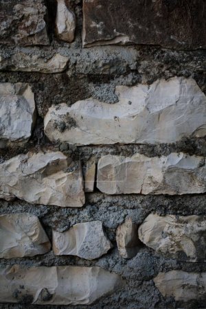 Foto de Un muro de piedra de veinte años en el abandonado pueblo griego de Kastri - Imagen libre de derechos