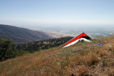 Photo for A beautiful shot of a hang glider on top of a mountain at Bear Mountain State Park, California - Royalty Free Image