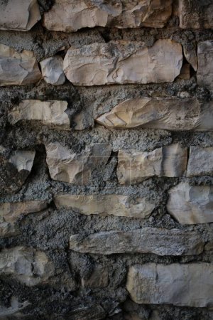 Foto de Un muro de piedra de veinte años en el abandonado pueblo griego de Kastri - Imagen libre de derechos