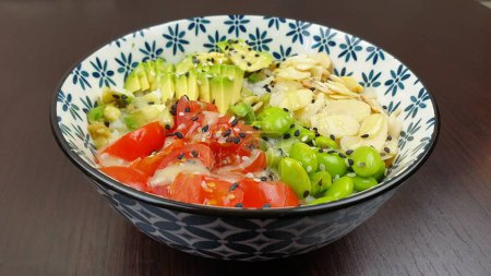 Photo for A closeup of a bowl of poke in a Japanese Restaurant - Royalty Free Image