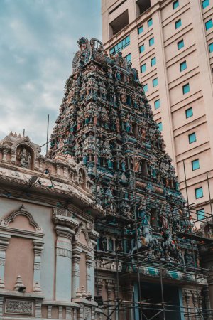 Photo for The Sri Mahamariamman Temple in Kuala Lumpur against a blue cloudy sky - Royalty Free Image