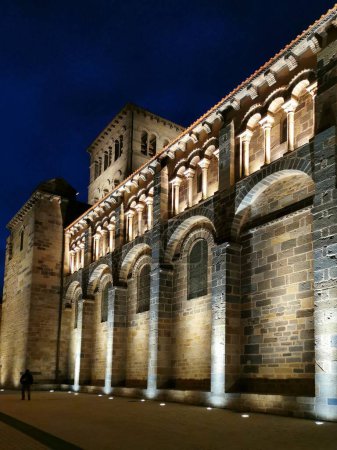 Photo for A vertical shot of the exterior of Abbatiale Saint Austremoine Romanesque church in Issoire, France - Royalty Free Image