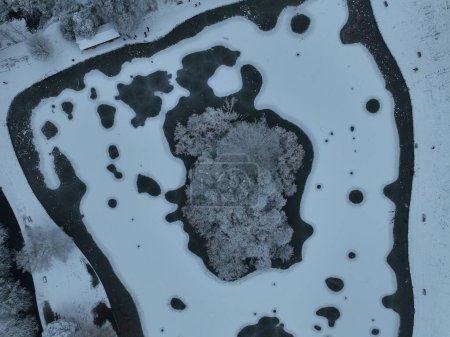 Photo for A drone shot of the snowy Verulamium Park of St Albans - Royalty Free Image
