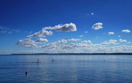 Photo for The calm Baltic Sea on a sunny day with the horizon and the blue sky in the background - Royalty Free Image