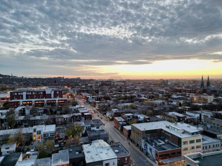 Photo for A drone shot of the residential building in Montreal city at sunset - Royalty Free Image