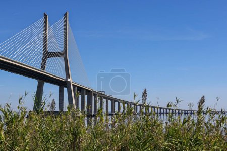 Photo for Landscape in a beautiful day at Vasco of Gama Bridge in Lisbon, Portugal - Royalty Free Image