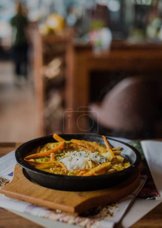 Photo for A close-up shot of a delicious-looking meal with vegetables served in a restaurant - Royalty Free Image