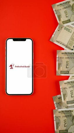 Photo for IndusInd Bank limited on the mobile phone screen, isolated background - Royalty Free Image