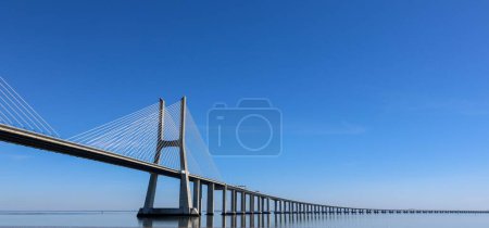 Photo for Panoramic landscape over the Vasco of Gama Bridge on the Tagus River in Lisbon, Portugal - Royalty Free Image