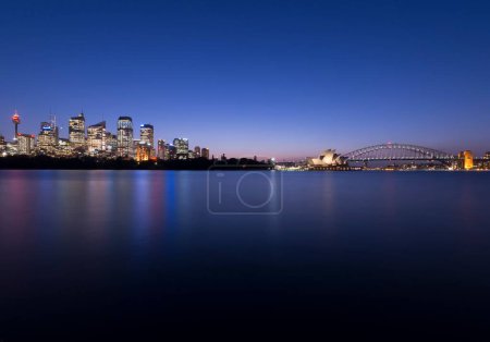 Photo for A long exposure shot of the city of Sydney from the sea in the evening, Australia. - Royalty Free Image