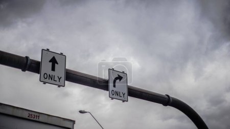 Photo for A grayscale road design of only forward and only right turns  with clouds in the background - Royalty Free Image