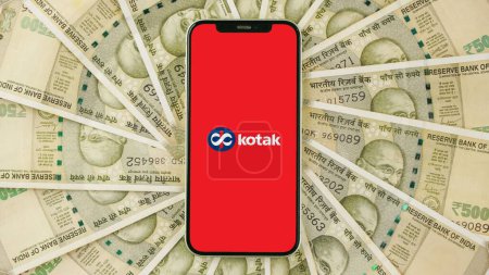 Photo for Kotak Mahindra Bank on mobile phone screen - Royalty Free Image