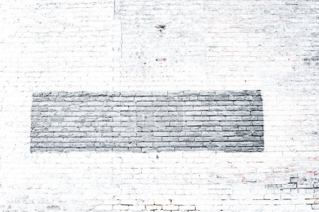 Téléchargez les photos : Plan noir et blanc d'une vieille texture murale de brique d'un ancien bâtiment dans la rue - en image libre de droit