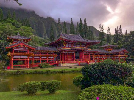 Photo for The landscape of Byodo-in Temple with a pond on the background of the green hills - Royalty Free Image