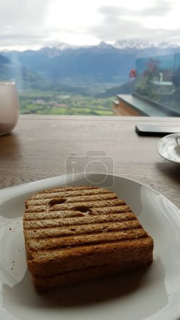 Photo for Sanswich on plate with mountain view - Royalty Free Image