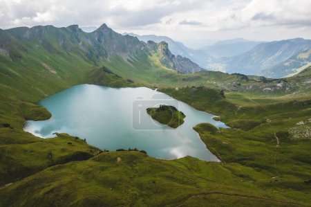 Photo for A scenic drone shot of a mountain lake under the cloudy sky in a gloomy day - Royalty Free Image