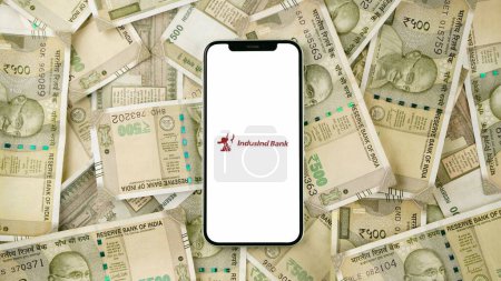 Photo for IndusInd Bank limited on the mobile phone screen, isolated background - Royalty Free Image