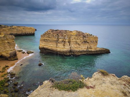 Photo for The rock formations on the beach of Sao Rafael, Albufeira, Portugal - Royalty Free Image