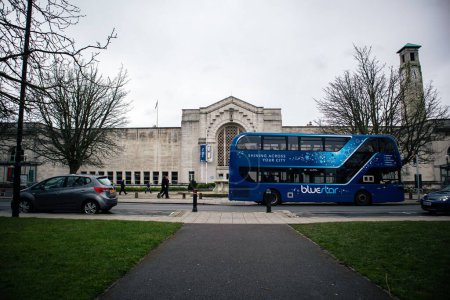 Photo for A blue star bus near the SeaCity Museum on a gloomy day in Southampton, the UK - Royalty Free Image