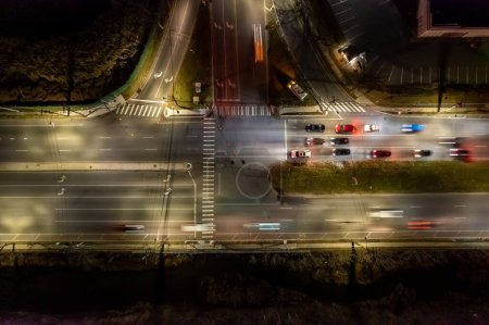 Photo for A beautiful top view of roads with a long exposure of passing cars - Royalty Free Image