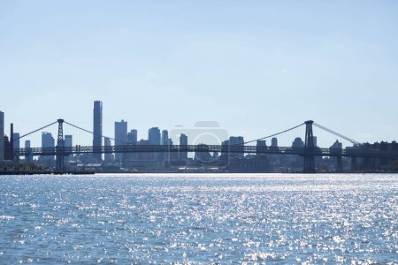Photo for A view of the Brooklyn bridge and Manhattan from the water in New York City, United States. - Royalty Free Image