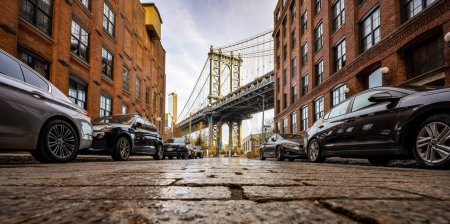 Photo for A low-angle of Manhattan bridge view from Dumbo, Washington street - Royalty Free Image