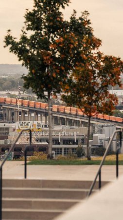 Photo for A vertical shot of the Boulevard Brewing Company and train tracks in the background in Kansas City. - Royalty Free Image