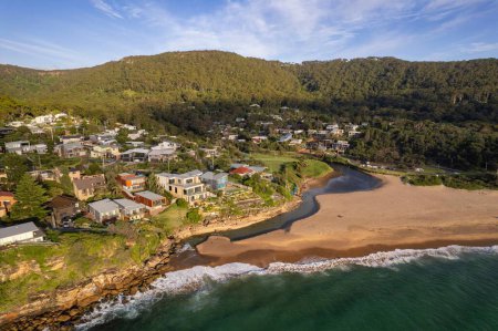 Photo for A Drone shot over green Stanwell park beach on a sunny day - Royalty Free Image