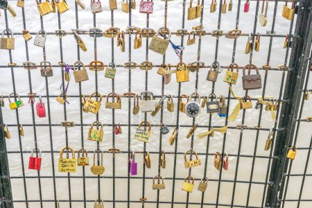 Photo for The bridge in Paris, France where people have added locks to depict their everlasting love - Royalty Free Image