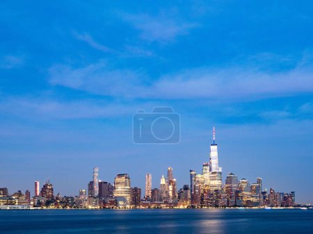 Photo for An aerial skyline of Manhattan in New York City, United States on blue sky background - Royalty Free Image