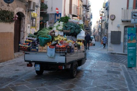 Photo for The fruits and vegetables cart on the streets of Cefalu, Italy - Royalty Free Image