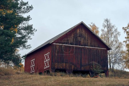 Photo for A rural  barn. Nes and Helga, ya Island in Lake Mja, a cloudy day in autumn. - Royalty Free Image