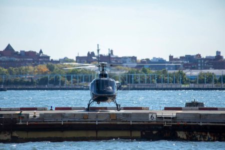 Photo for A black helicopter on a heliport in Manhattan, New York city - Royalty Free Image