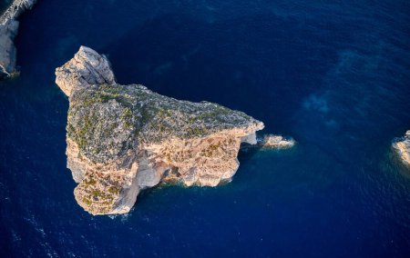 Photo for An aerial view of Fungus Rock in Dwejra bay, in Gozo island, Malta - Royalty Free Image