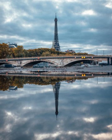 Photo for The famous Eiffel tower in the background of the Seine river in Paris, France - Royalty Free Image