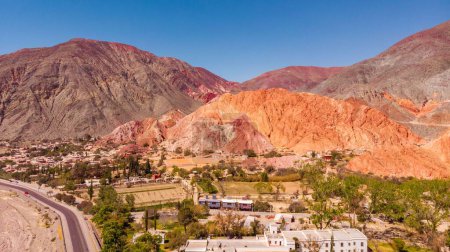 Photo for A landscape view with mountain and colored hills on a sunny day, Purmamarca town in Jujuy, Argentina - Royalty Free Image