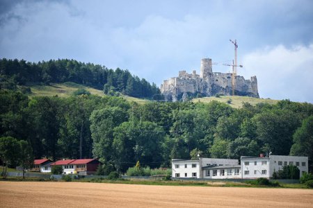 Photo for The Spissky Castle with a cloudy blue sky in the background, in Zegre, Slovakia - Royalty Free Image