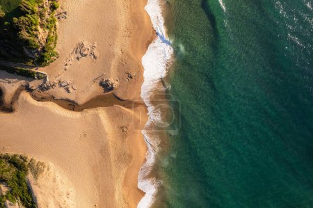 Photo for A Drone top shot over sea water and sandy beach - Royalty Free Image