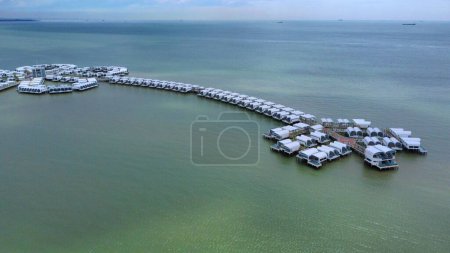 Photo for A bird's-eye view of buildings on a pier in the middle of the sea - Royalty Free Image