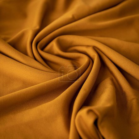 Téléchargez les photos : Un tissu épais brun brillant photographié avec un motif ondulé - en image libre de droit