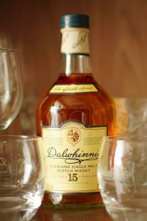 Photo for A vertical shot of a bottle of Dalwhinnie Highland Single Malt Scotch Whiskey - Royalty Free Image