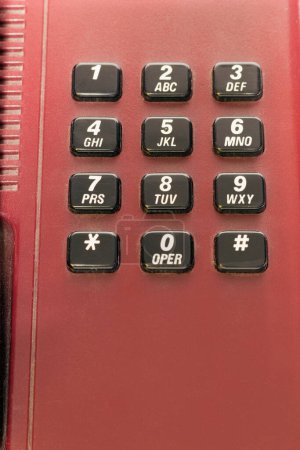 Photo for Close-up of a red telephone keypad - Royalty Free Image