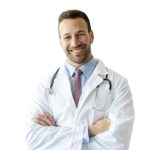 Healthcare, profession. Closeup portrait of happy european male doctor in white uniform with stethoscope posing with crossed arms over isolated white background